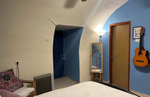 Artists Colony Bed & Breakfast | charming Tzimmer steps above the HaAri Mikvah and views of Meron