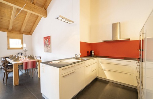 Engadin Scoul Apartment | Chasa Capricornin: modern and spacious attic apartment right next to the Motta Naluns mountain railroad
