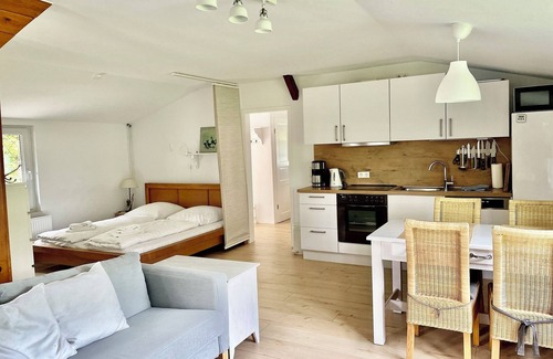 Hasselberg Apartment | Chicken coop - shower room, terrace, garden, sauna, close to the beach, child-friendly