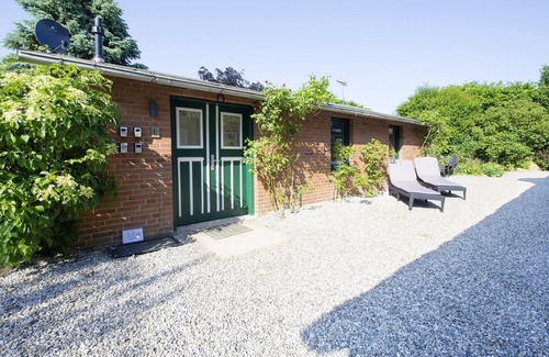 Hasselberg Apartment | Chicken coop - shower room, terrace, garden, sauna, close to the beach, child-friendly