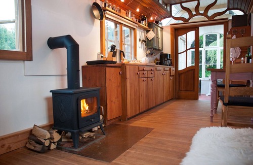 Windeck House | Circus wagon by the river