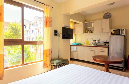 Ngara West Apartment | City View with Rooftop pool Studio