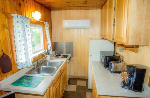 Puposky Cabin | Classic Minnesota Lakefront Cabin - Private Beach & Resort Amenities