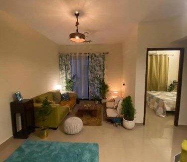 Navi Mumbai Apartment | Classy bohemian Blue Door Home near Atal Setu Ulwe