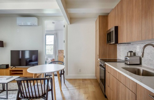 East Village Apartment | Clean East Village 1BR w/Rooftop Pool, Gym, W/D, A/C, by Blueground
