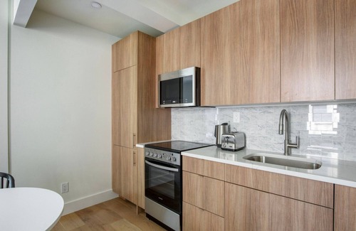 East Village Apartment | Clean East Village 1BR w/Rooftop Pool, Gym, W/D, A/C, by Blueground