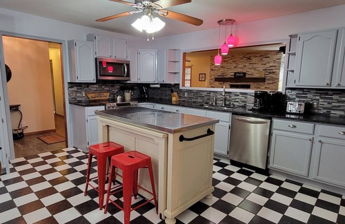 Rogers House | Close to town! Lake view, fire pit, fenced backyard