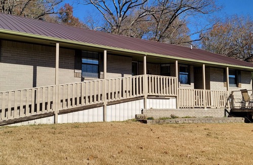 Rogers House | Close to town! Lake view, fire pit, fenced backyard