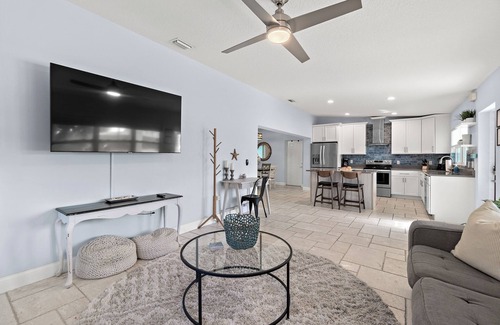 Cleggmoor House | Cocoa Beach Home with Heated Pool, 4-Minute Walk to the Beach & Dog Friendly!