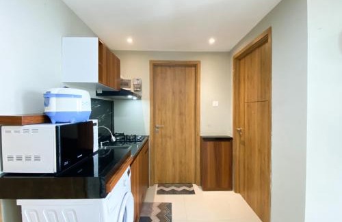 Duren Sawit Apartment | Comfort 1BR at Gateway Park LRT City Jatibening Apartment By Travelio