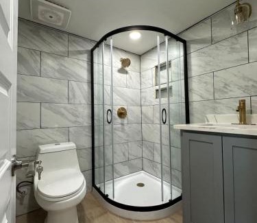 Garfield House | Comfortable Bed in Shared Luxury Tiny Home