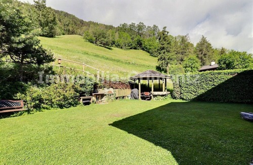Lauenen Bei Gstaad Ski Chalet | Comfortable chalet on 3 levels for 5 people in Mayoux, living room with wood-burner, kitchen area wi
