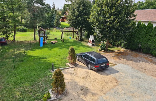 Powidz Apartment | Comfortable rooms near the lake.