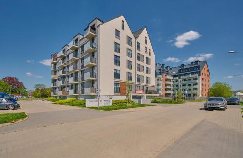Fabryczna Apartment | Comfy Apartment with Parking & Balcony by Noclegi Renters