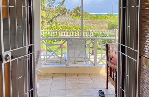 Newcastle Cottage | CONCH SHELL COTTAGE at white sand beach.