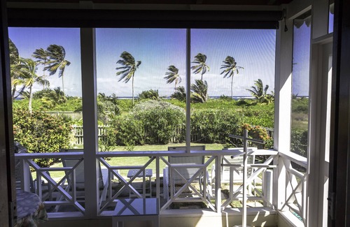 Newcastle Cottage | CONCH SHELL COTTAGE at white sand beach.