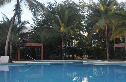 El Batey Apartment | Condo On Quiet Sandy Beach, With Infinity Pool, A/C, BBQ, Wi-fi, Near Everything