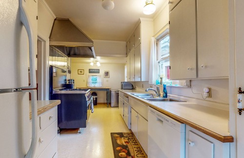 Lakeport House | Corner Lot Home, Carriage House & Enchanting Yard