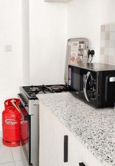 Manyimbo Bed & Breakfast | COSY 1,2BR 43' SMART Tv