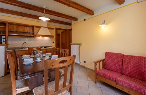 Sampeyre Apartment | Cosy apartment for 4 people with pool, WIFI, TV, terrace and parking