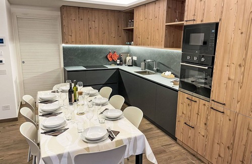 Bianzone House | Cosy apartment in villa for 8 guests with A/C, WIFI, TV, terrace, pets allowed and parking