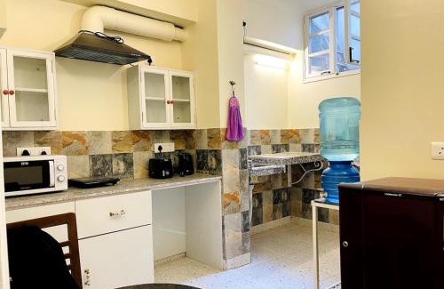 Hauz Khas Village Apartment | Cosy Box -Basement Apartment