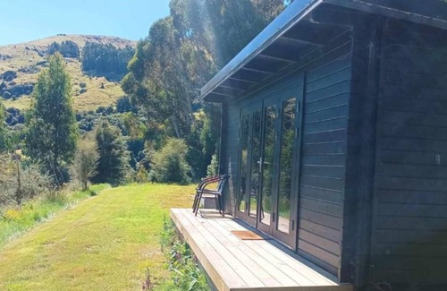 Little River Cabin | Cosy rustic escape surrounded by nature