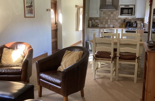 Holmbury St Mary Cottage | Cottage sympathetically converted from farm buildings the heart of Surrey Hills