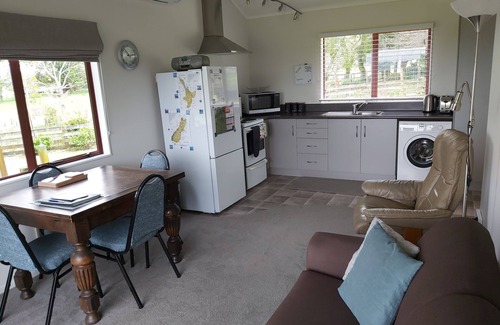 Hamurana Cottage | Country cottage with stunning rural countryside and lake views