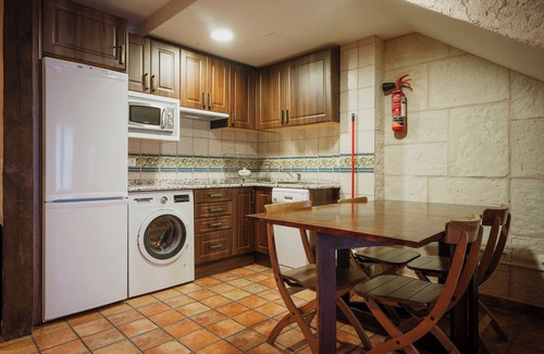 Lerma House | Country House 'El Desvan Del Brigante' with Balcony, Wi-Fi and Air Conditioning