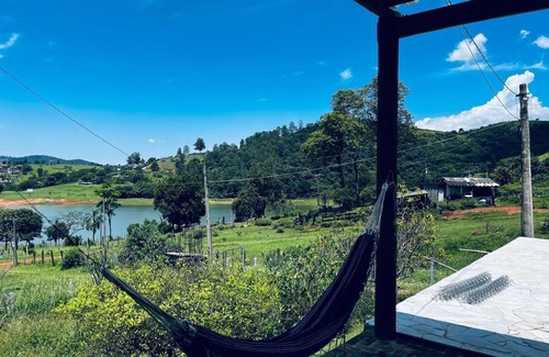 Agua Comprida House | Cozy farm in front of the dam, for water sports and fishing.