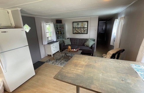 Laketon RV Rental | Cozy 2-bedroom campground in peaceful Claypool with AC, WiFi. Overlooking laken