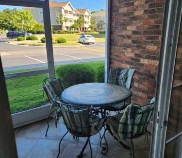 North Myrtle Beach Apartment | Cozy 2 BR Getaway and Peaceful Patio