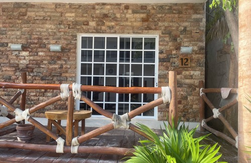 Downtown Holbox Apartment | Cozy apartment in charming Holbox with AC, WiFi cuarto en planta baja