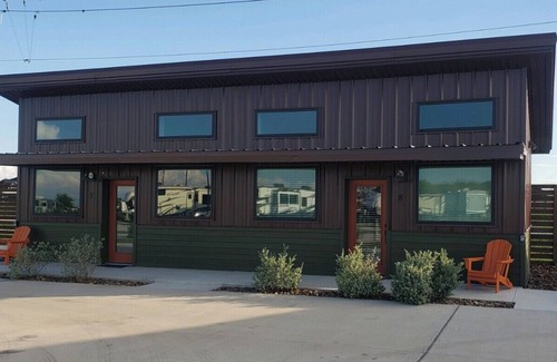 Uhland Cabin | Cozy cabin with queen bed, full kitchen, and refreshing walk-in shower.