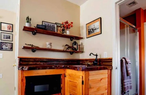 Beggs Apartment | Cozy efficiency on Main St. in Beggs America, highlighting The Blucher Boot Co.
