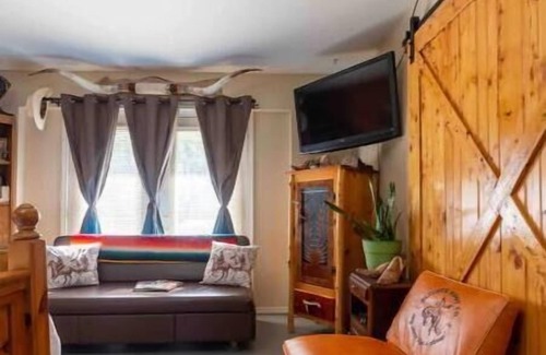 Beggs Apartment | Cozy efficiency on Main St. in Beggs America, highlighting The Blucher Boot Co.