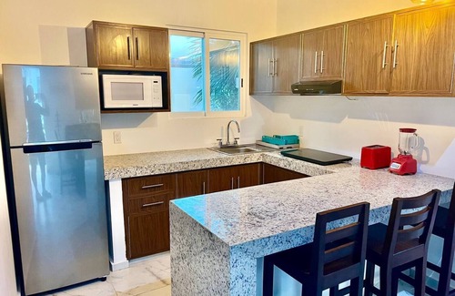 Isla Mujeres Condo | Cozy ground floor condo with Roof top and pool in Punta Sur