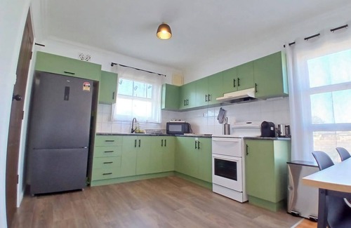 Whyalla Stuart House | Cozy industrial home with hot tub & fruit garden