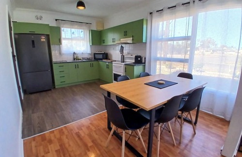 Whyalla Stuart House | Cozy industrial home with hot tub & fruit garden