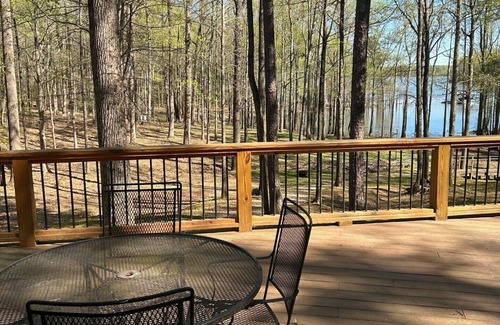 Henderson House | Cozy Kerr Lake waterfront home with private boat dock.