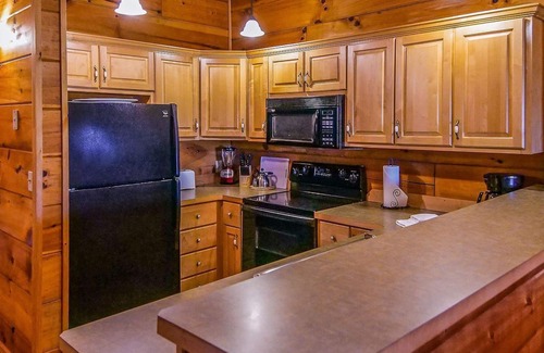 Spencer Cabin | Cozy, knotted pine lodge and cabin with fire pits, fireplaces, PET friendly