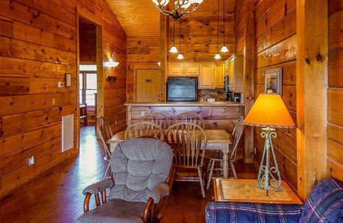 Spencer Cabin | Cozy, knotted pine lodge and cabin with fire pits, fireplaces, PET friendly