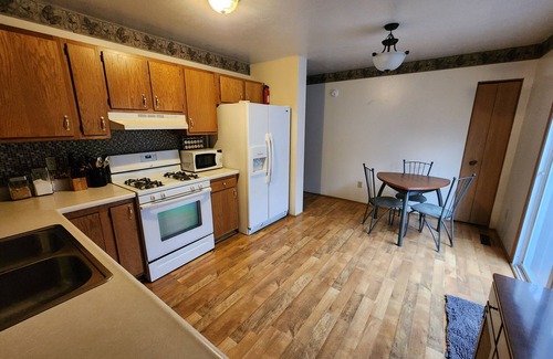 Elkhart House | Cozy & Quiet Home with Memory Foam and Pet Friendly with Fenced Yard