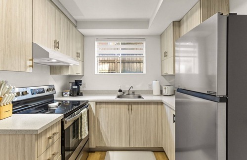 Laval Apartment | Cozy & Stylish Studio in Laval | Queen Murphy Bed
