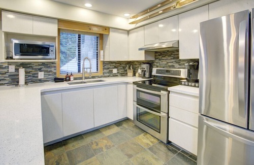 Upper Village Apartment | Cozy Upper Village 2BR:Sleeps 6,Hot Tub, Pool,Patio+ BBQ ,Near Lakes!