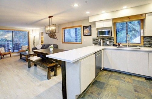 Upper Village Apartment | Cozy Upper Village 2BR:Sleeps 6,Hot Tub, Pool,Patio+ BBQ ,Near Lakes!