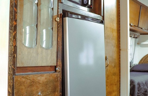 Poteau House | Cozy Vintage Airstream among the pines on World's Highest Hill. Pet-Friendly!