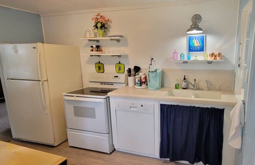 Twin Lake Cottage | Cozy Waterfront Comfy Cottage With Lakeside Fire Pit - Close to Lake Michigan
