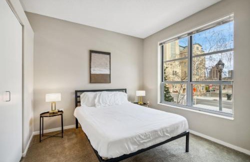 Mill District Apartment | CozySuites Mill District with pool, gym #01